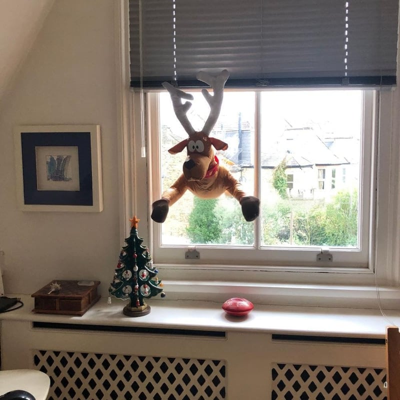 Décoration amusante « Oups ! » Père Noël et renne