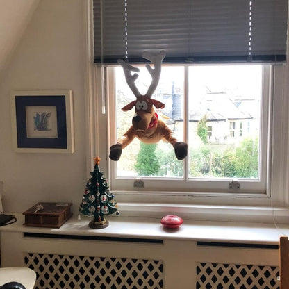 Décoration amusante « Oups ! » Père Noël et renne